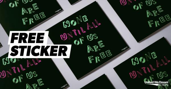 Speak Truth with a Sticker – Free ‘None Until All Are Free’