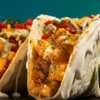 Taco Treat: Get a Free Queso Crunch Taco at Moe's with Purchase!